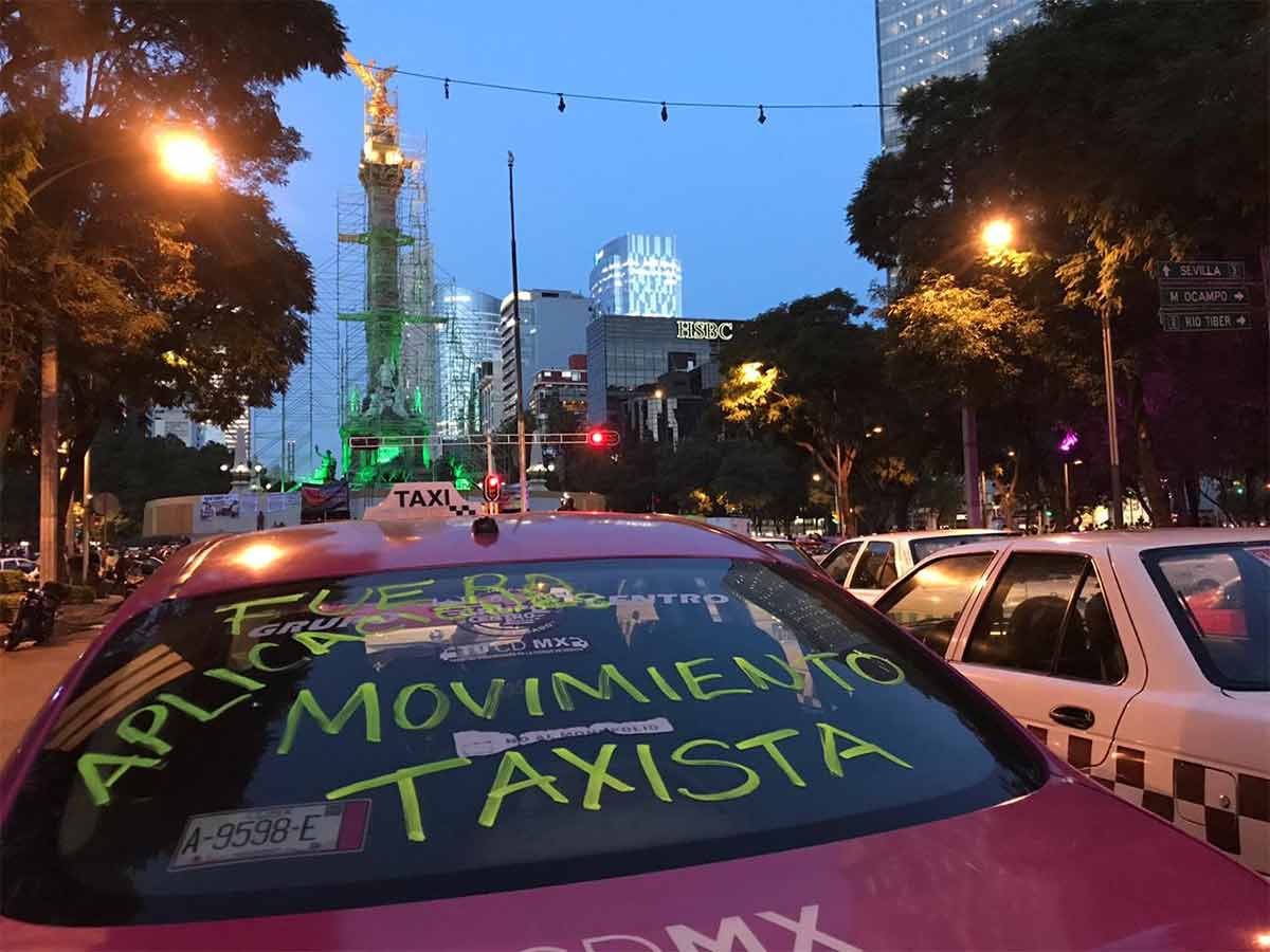 Con ‘no’ a Uber, Cabify, Didi, taxistas rodean el Ángel. Noticias en tiempo real